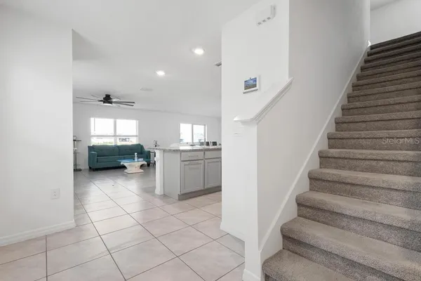 a view of an entryway with hallway