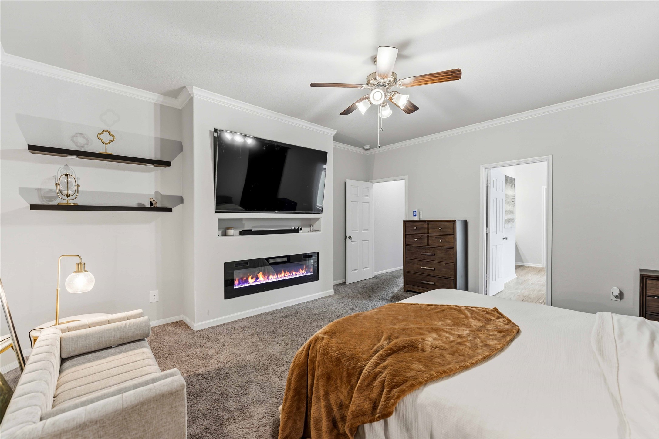 14810 Ruddy Duck Lane Houston, TX 77049 - Photo 14 of 33 a bedroom with a bed and a flat screen tv