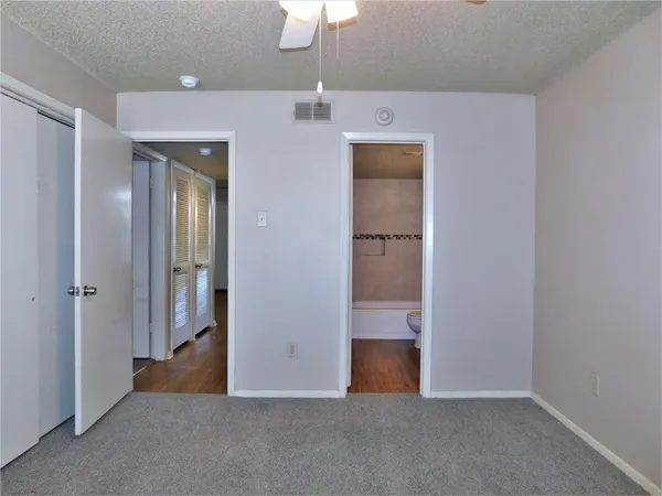 a view of a room with an empty space
