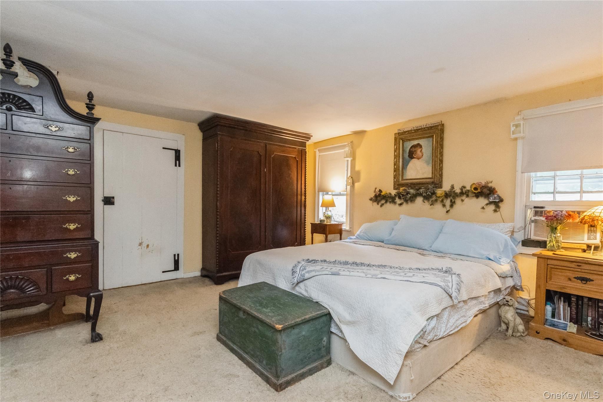 93 Widmer Road Wappingers Falls, NY 12590 - Photo 30 of 45 Original Primary Bedroom featuring light colored carpet over Wide Board Flrs. WIC