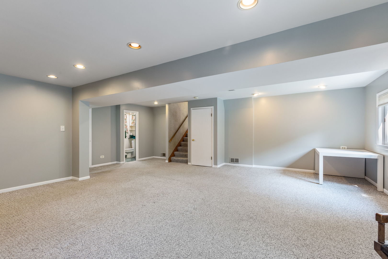 516 Indian Hill Road Deerfield, IL 60015 - Photo 12 of 28 an empty room with a cabinet and mirrors