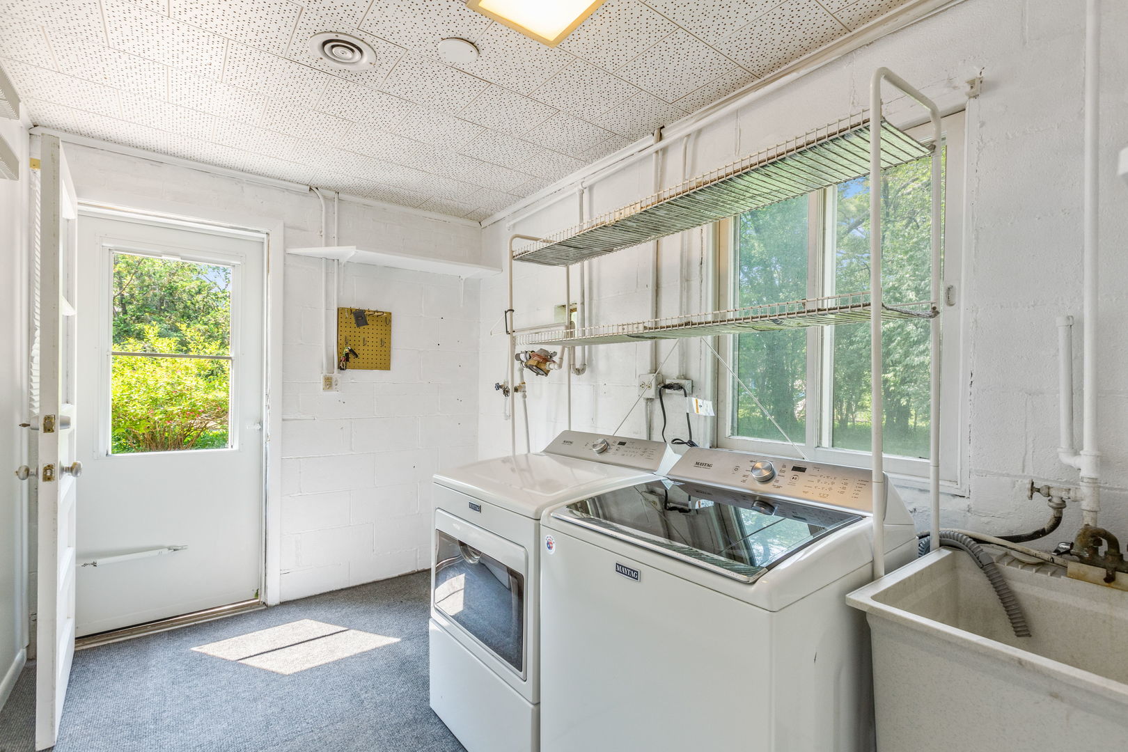 516 Indian Hill Road Deerfield, IL 60015 - Photo 23 of 28 a view of a sink and washer and dryer