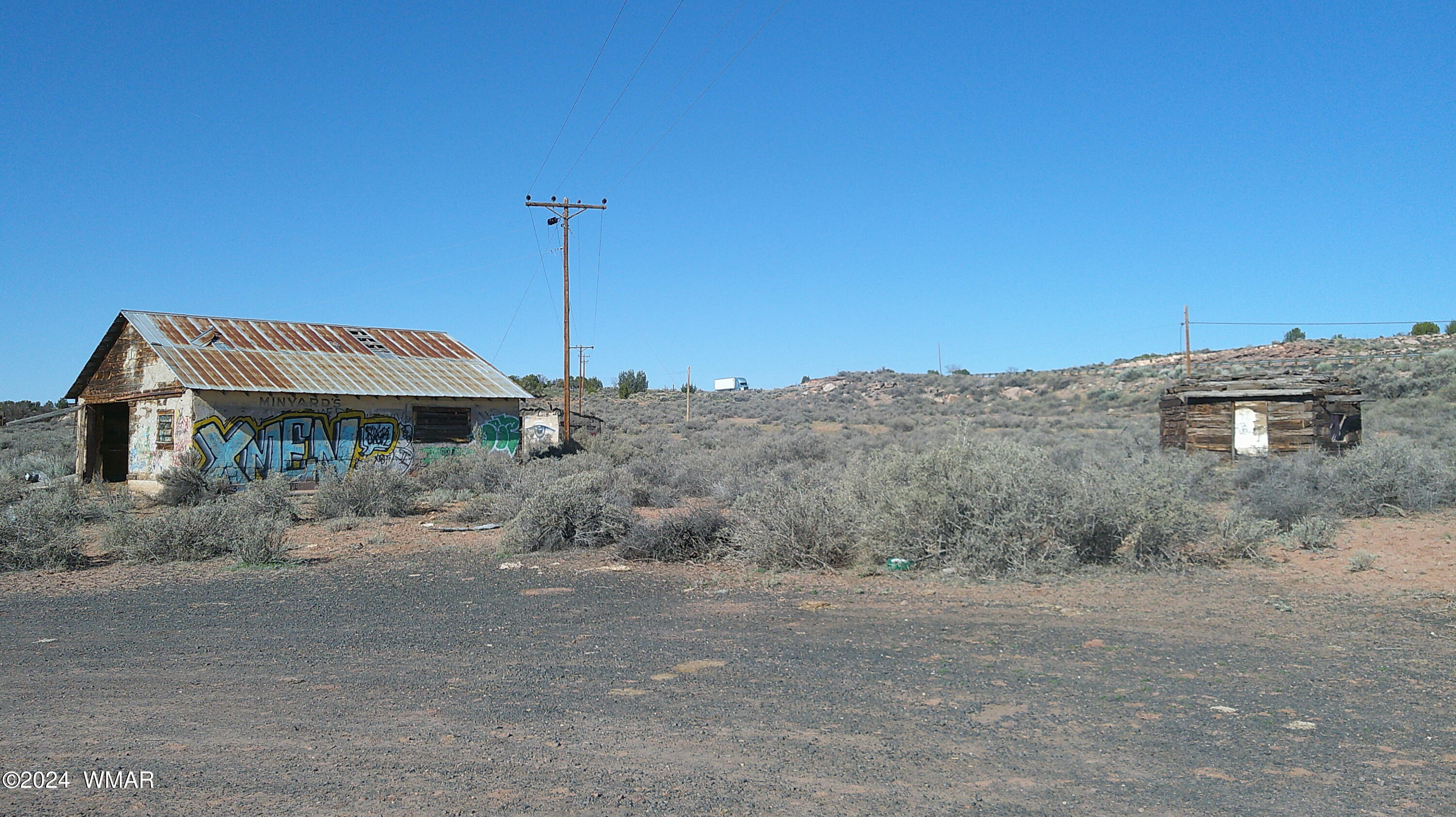 0 Chambers Chambers, AZ 86502 - Photo 19 of 64 a front view of a house with a yard