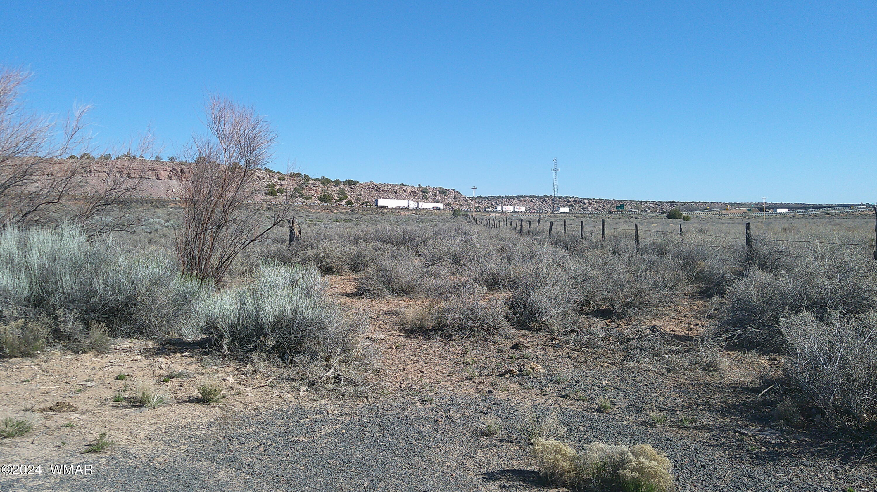 0 Chambers Chambers, AZ 86502 - Photo 23 of 64 a view of a dry field with trees in the background