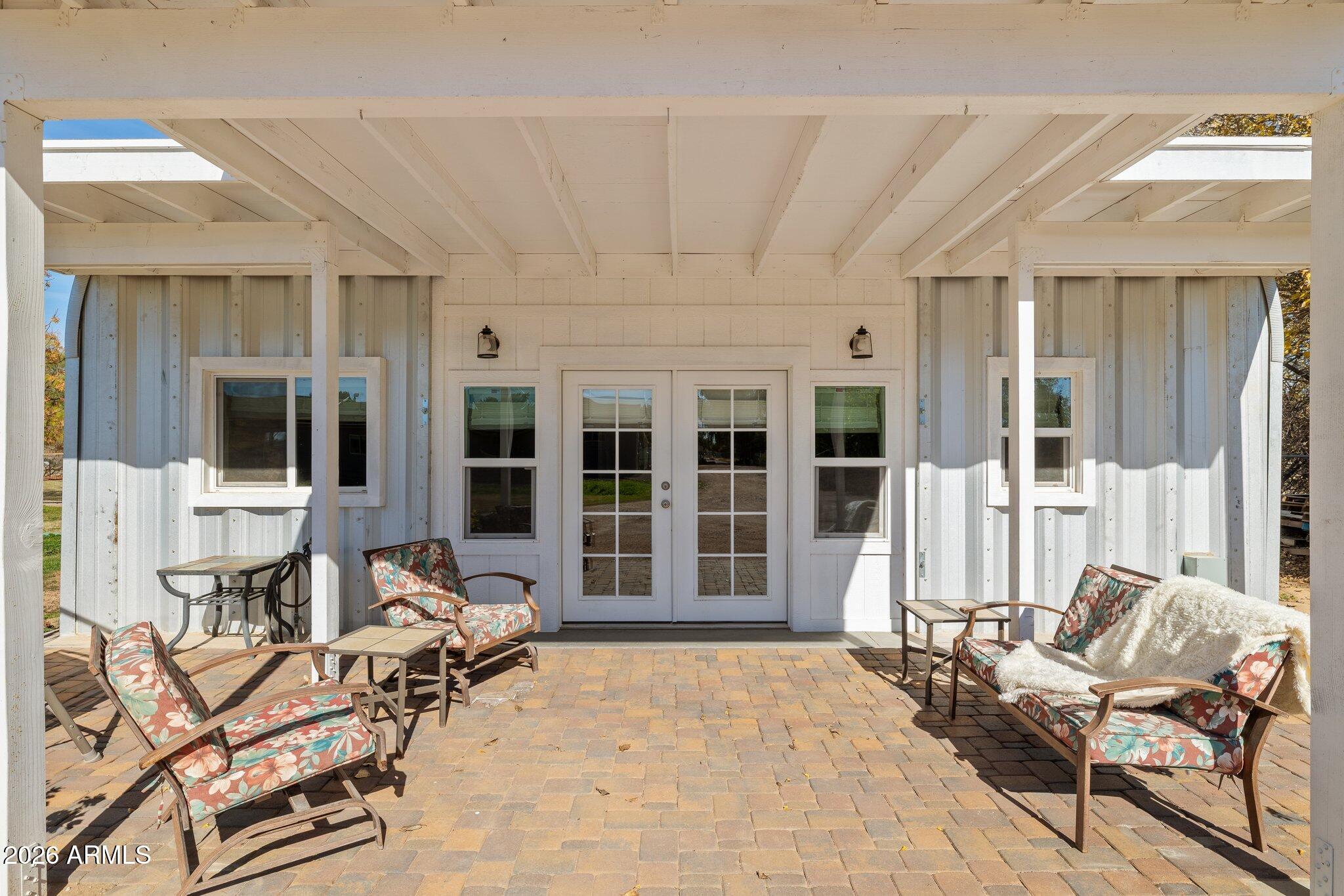 16226 East Fairview Street Gilbert, AZ 85295 - Photo 35 of 59 a front view of a house with outdoor seating