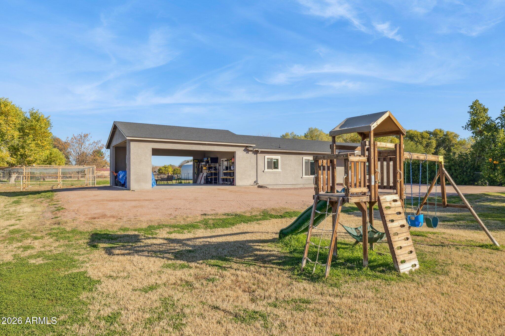16226 East Fairview Street Gilbert, AZ 85295 - Photo 50 of 59 a view of swimming pool with a yard