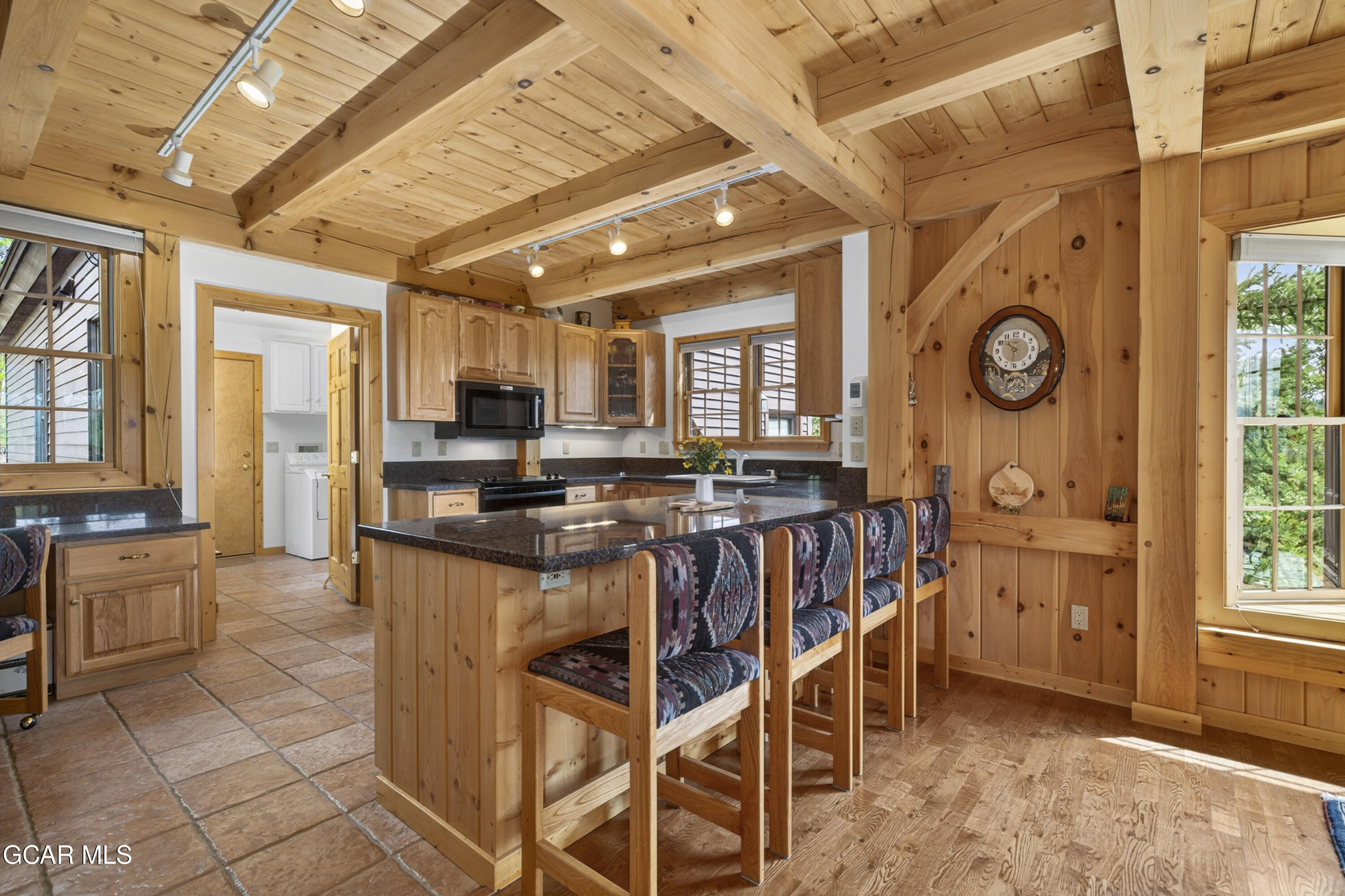 400 Ridge Road Tabernash, CO 80478 - Photo 25 of 50 a open kitchen with stainless steel appliances granite countertop a stove and cabinets