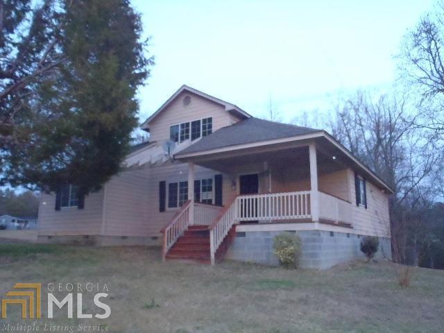 345 West Troutman Road Northeast Rome, GA 30165 - Photo 1 of 1 a view of a house with a yard