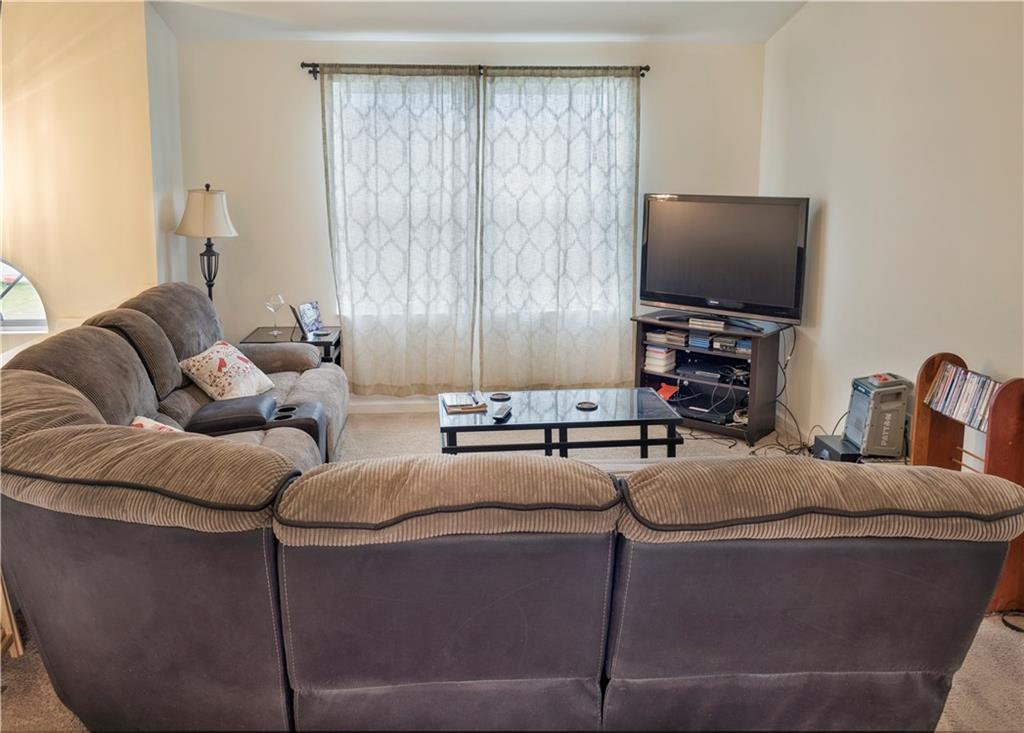 214 West Country Barn Road Houston, PA 15342 - Photo 4 of 14 LIVING ROOM IS LARGE ENOUGH FOR YOUR BIG, COMFY COUCH! LARGE WINDOW LETS IN PLENTY OF NATURAL LIGHT