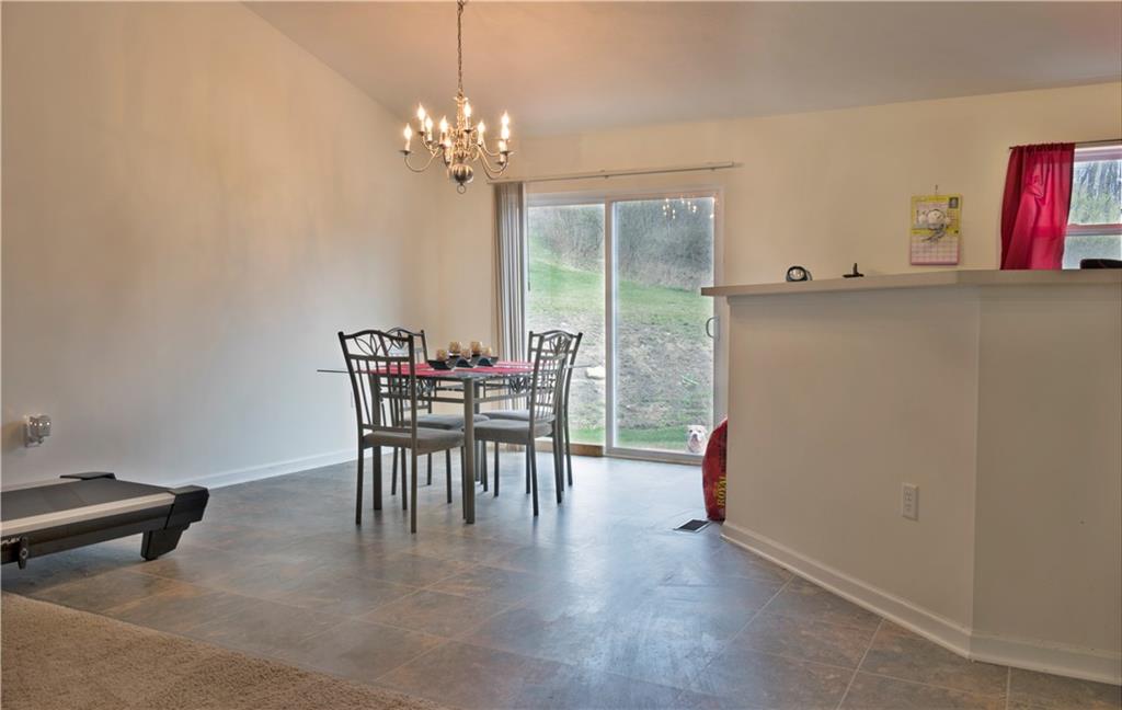 214 West Country Barn Road Houston, PA 15342 - Photo 5 of 14 OPEN FLOOR PLAN MAKES FOR EASY ENTERTAINING! SLIDING DOOR LEADS TO BEAUTIFUL BACK YARD