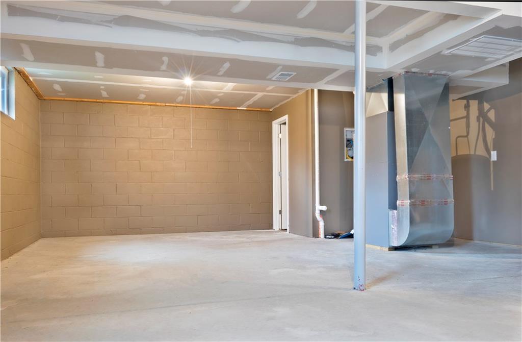 214 West Country Barn Road Houston, PA 15342 - Photo 9 of 14 LOWER LEVEL IS HUGE! HALF BATH IS INSTALLED.