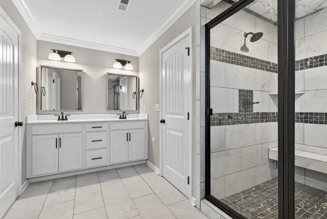 a view of a house with backyard and a tree