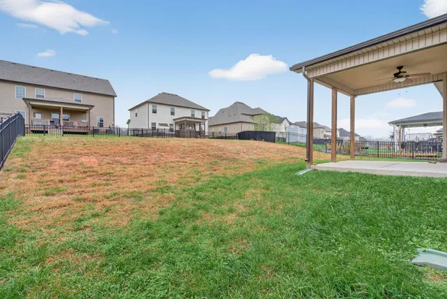 a view of a house with a big yard
