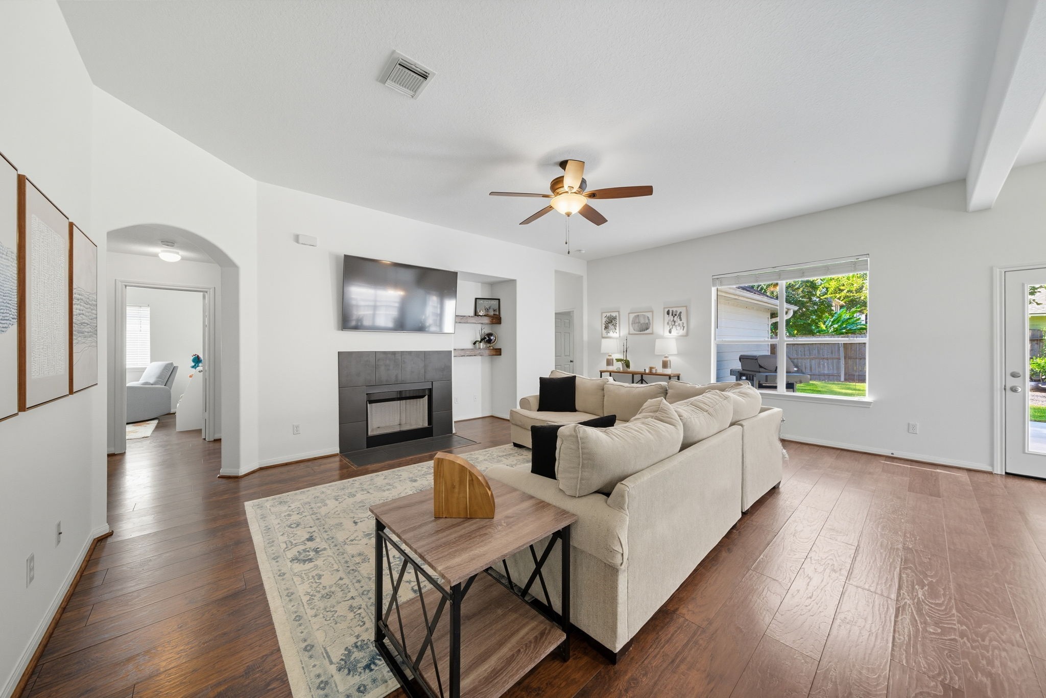 3323 Rollingwood Montgomery, TX 77356 - Photo 20 of 43 a living room with furniture and a fireplace