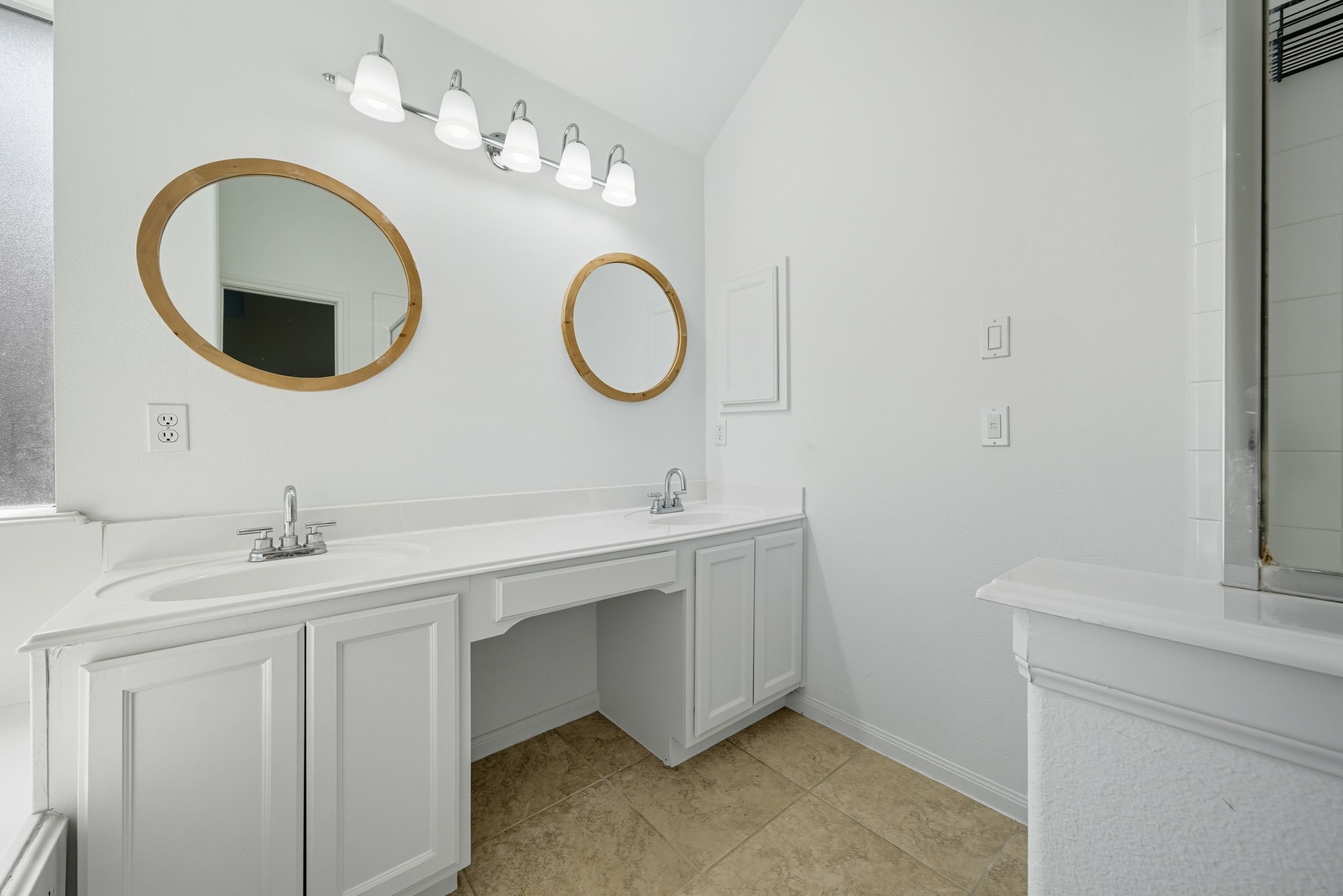 3323 Rollingwood Montgomery, TX 77356 - Photo 25 of 43 a bathroom with a double vanity sink and a mirror