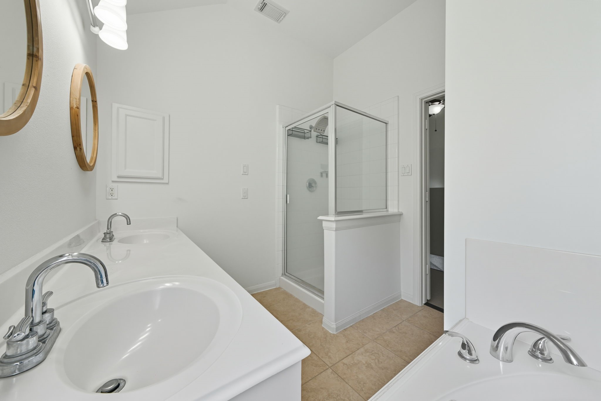 3323 Rollingwood Montgomery, TX 77356 - Photo 26 of 43 a bathroom with a sink and a mirror