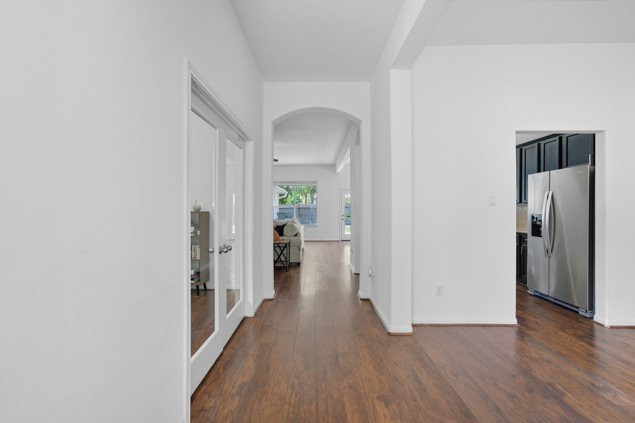 3323 Rollingwood Montgomery, TX 77356 - Photo 3 of 43 a view of a hallway with wooden floor and closet
