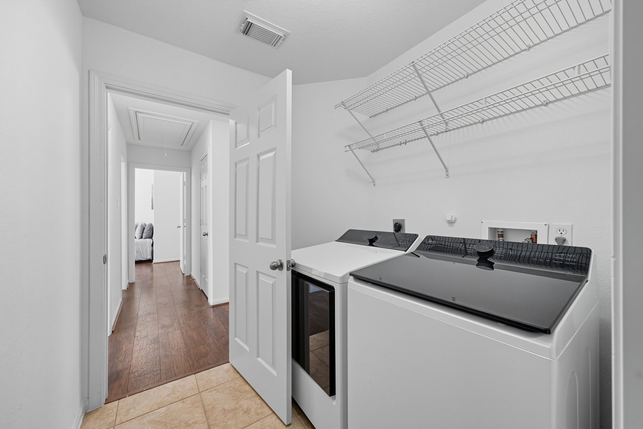 3323 Rollingwood Montgomery, TX 77356 - Photo 31 of 43 a utility room with dryer and washer