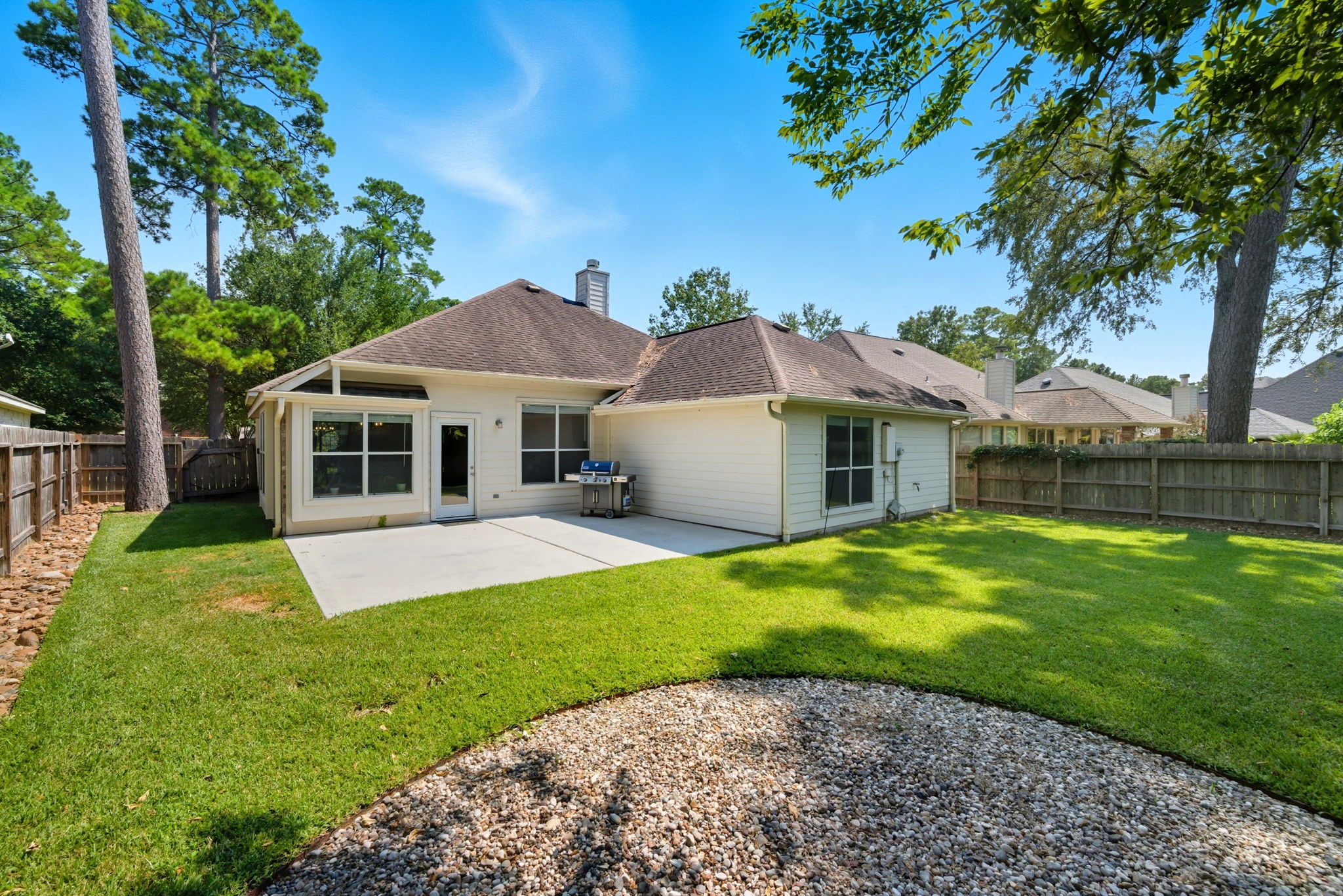 3323 Rollingwood Montgomery, TX 77356 - Photo 32 of 43 a house with green field in front of it