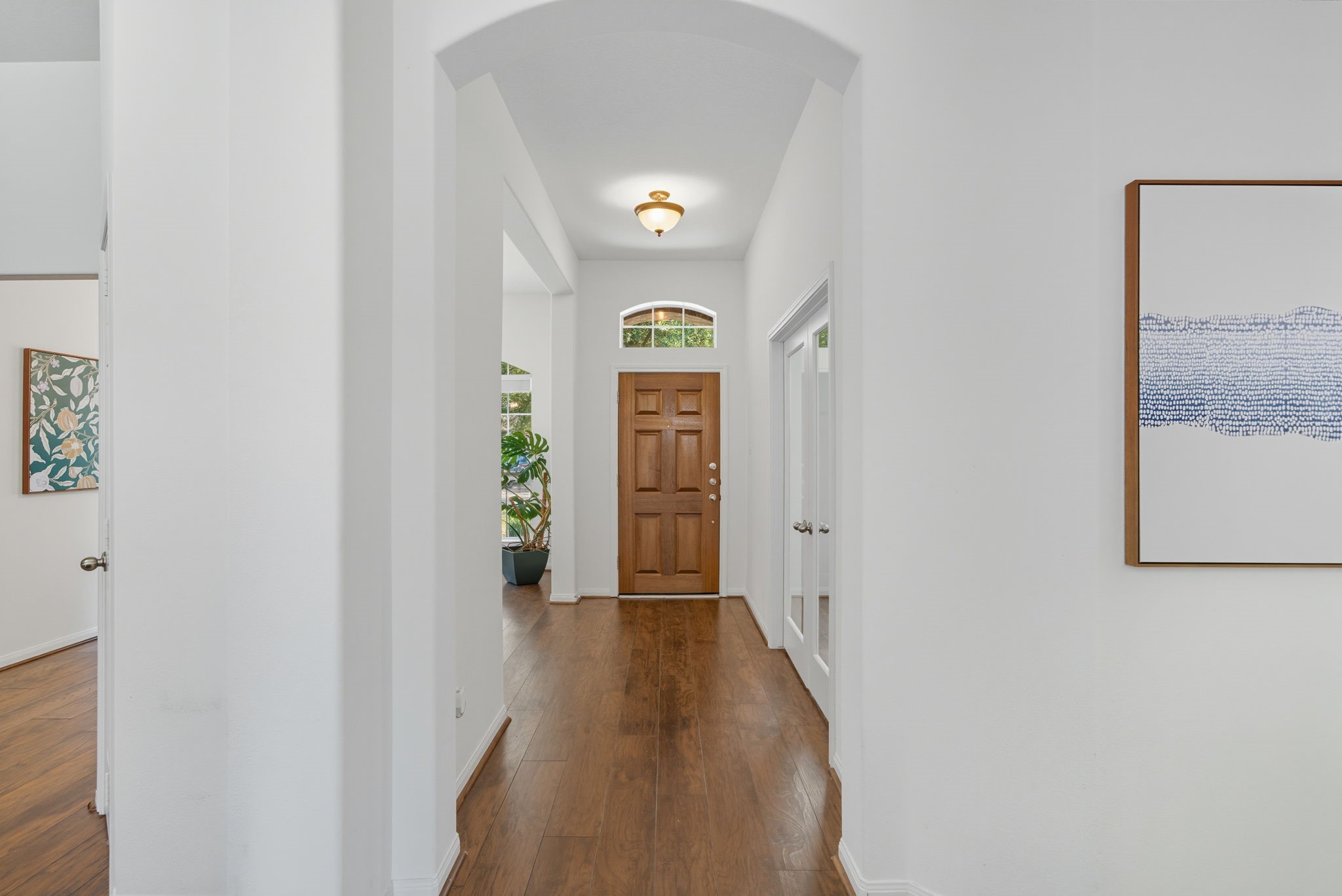 3323 Rollingwood Montgomery, TX 77356 - Photo 4 of 43 a view of a hallway view with wooden floor
