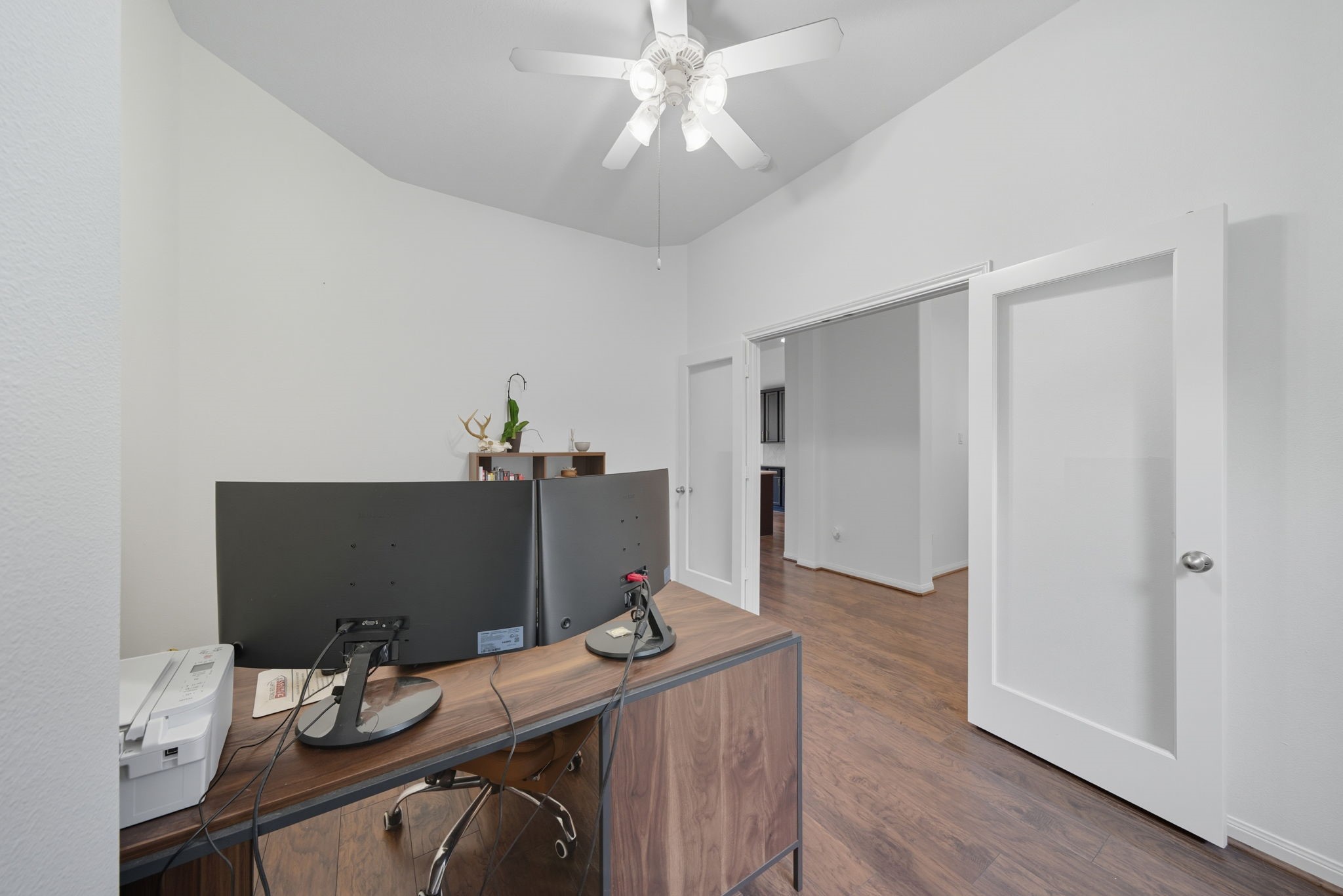 3323 Rollingwood Montgomery, TX 77356 - Photo 6 of 43 a workspace with furniture and wooden floor