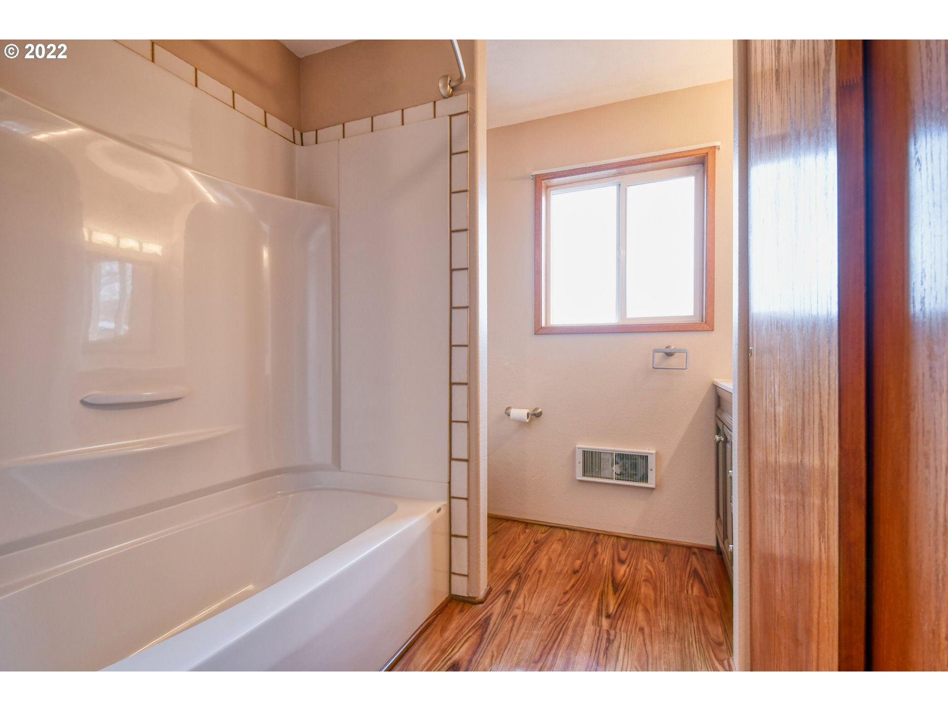 2011 Southwest Quinney Avenue Pendleton, OR 97801 - Photo 21 of 26 a bathroom with a bathtub and a shower