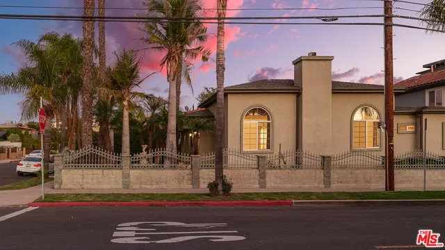 a view of a street with cars on the road