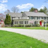 a bathroom with a window a sink and a window