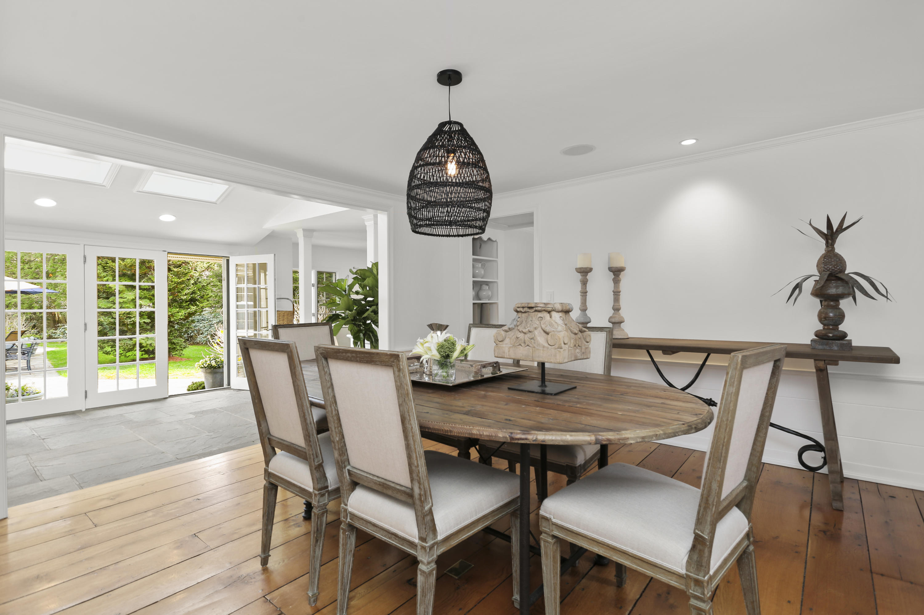 15 Old Farm Road Darien, CT 06820 - Photo 12 of 90 a view of a dining room with furniture window and wooden floor