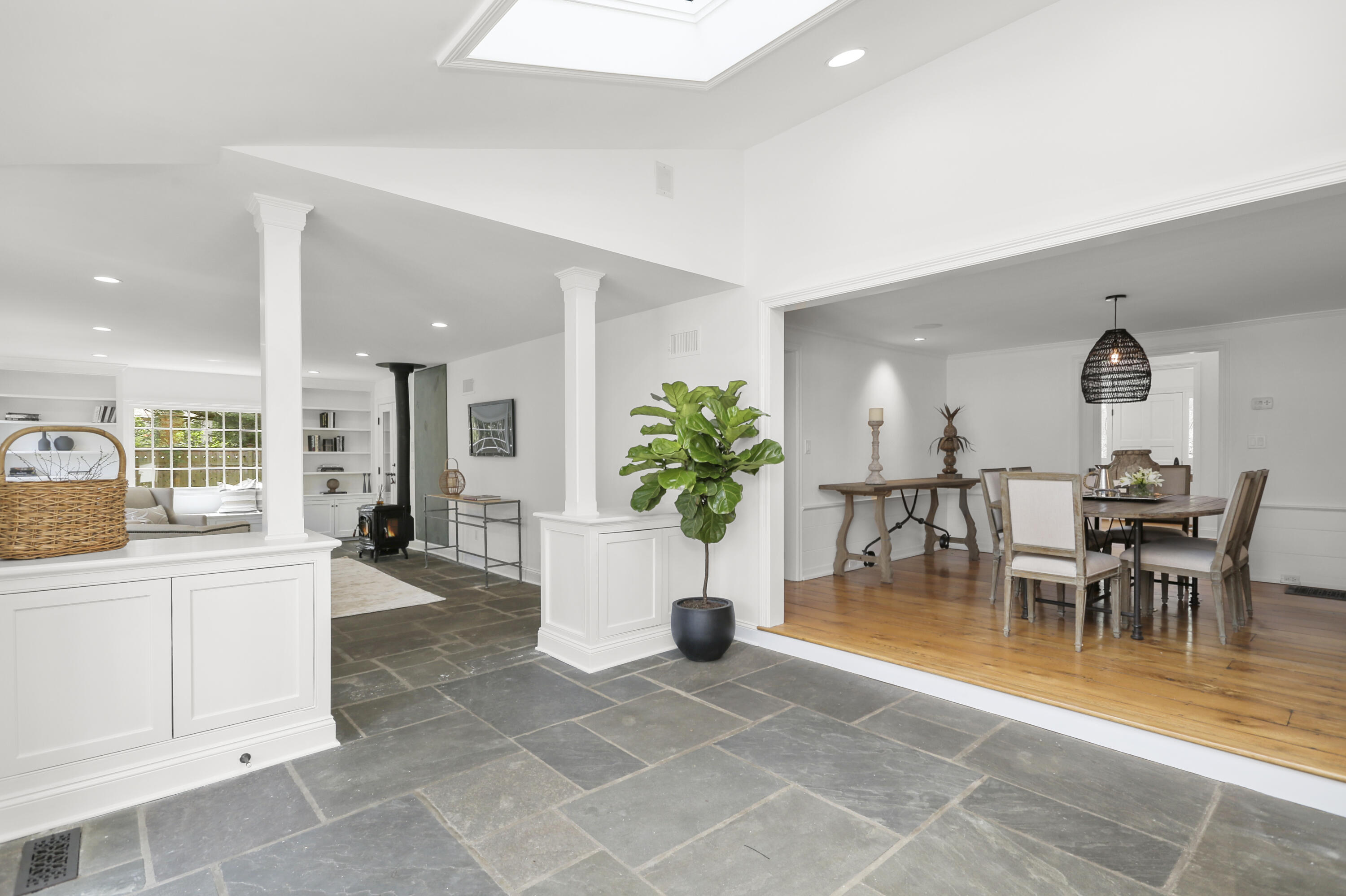 15 Old Farm Road Darien, CT 06820 - Photo 15 of 90 a view of a dining room kitchen with furniture and a potted plant