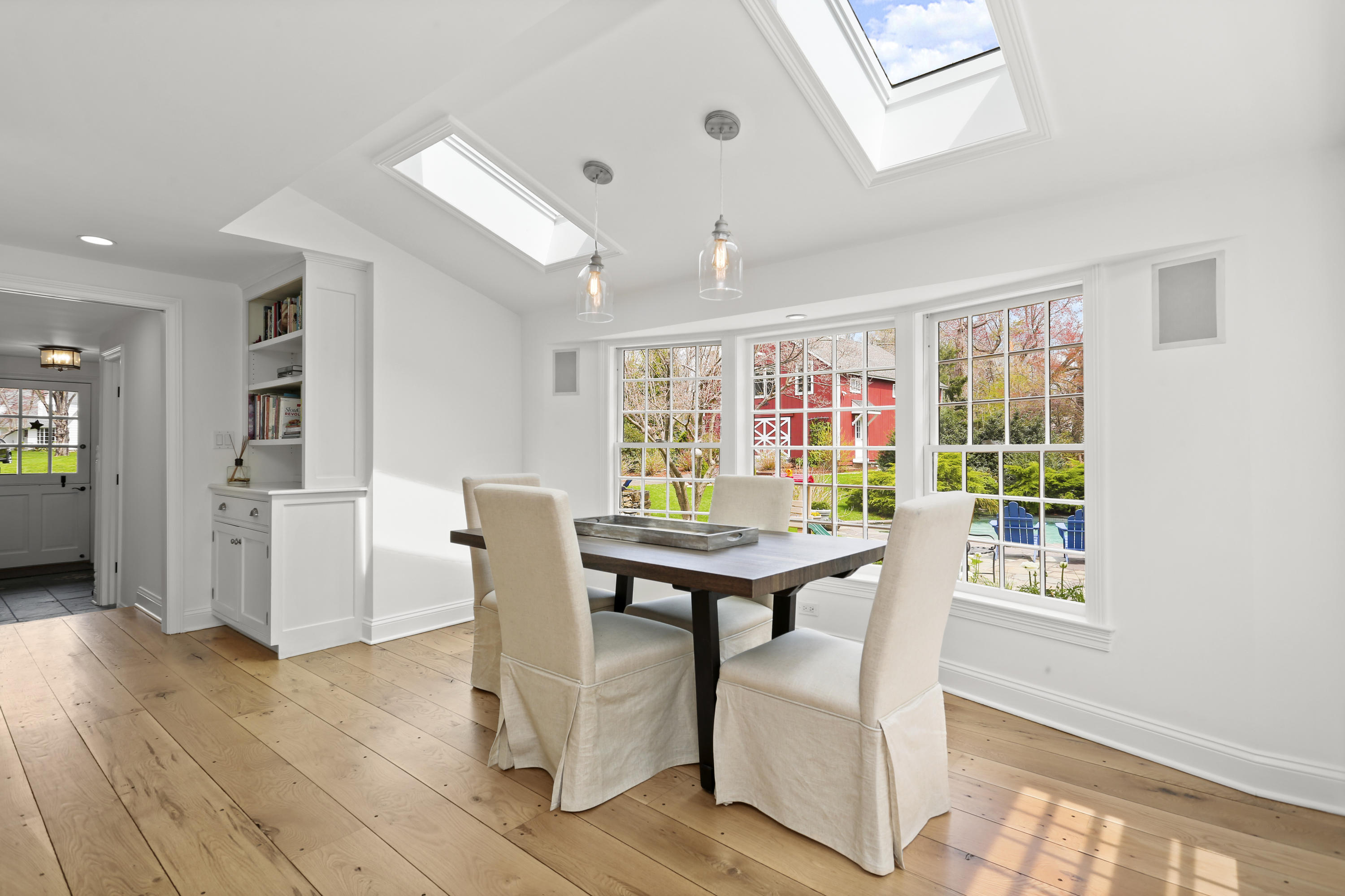 15 Old Farm Road Darien, CT 06820 - Photo 21 of 90 a view of a dining room with furniture window and wooden floor