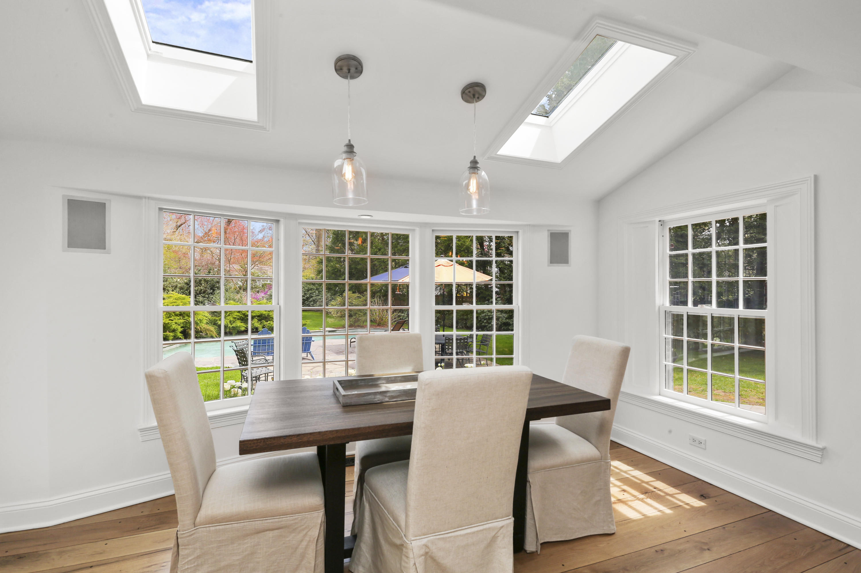 15 Old Farm Road Darien, CT 06820 - Photo 22 of 90 a view of a dining room with furniture window and wooden floor