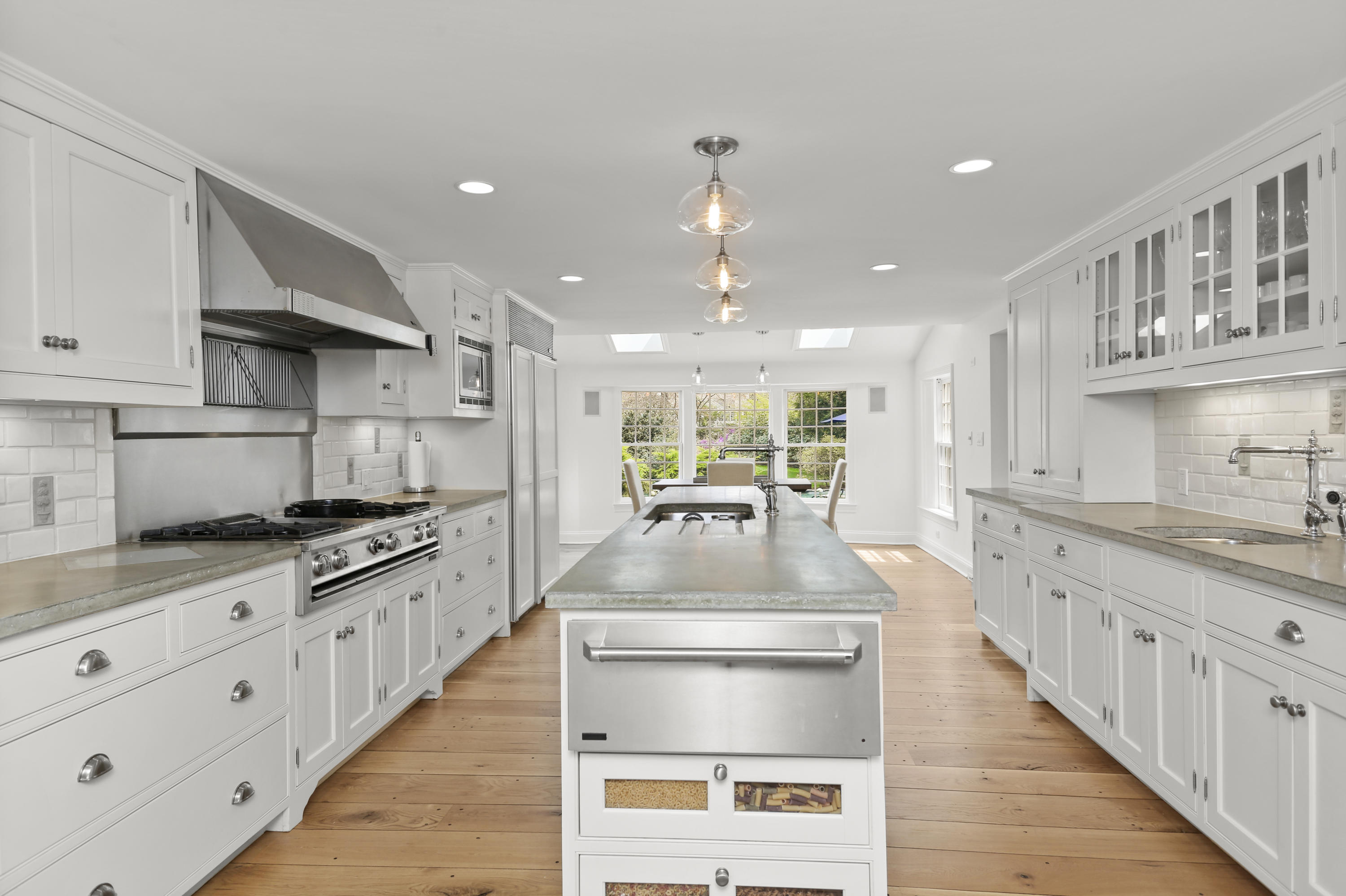 15 Old Farm Road Darien, CT 06820 - Photo 27 of 90 a kitchen with stainless steel appliances granite countertop a stove and a sink