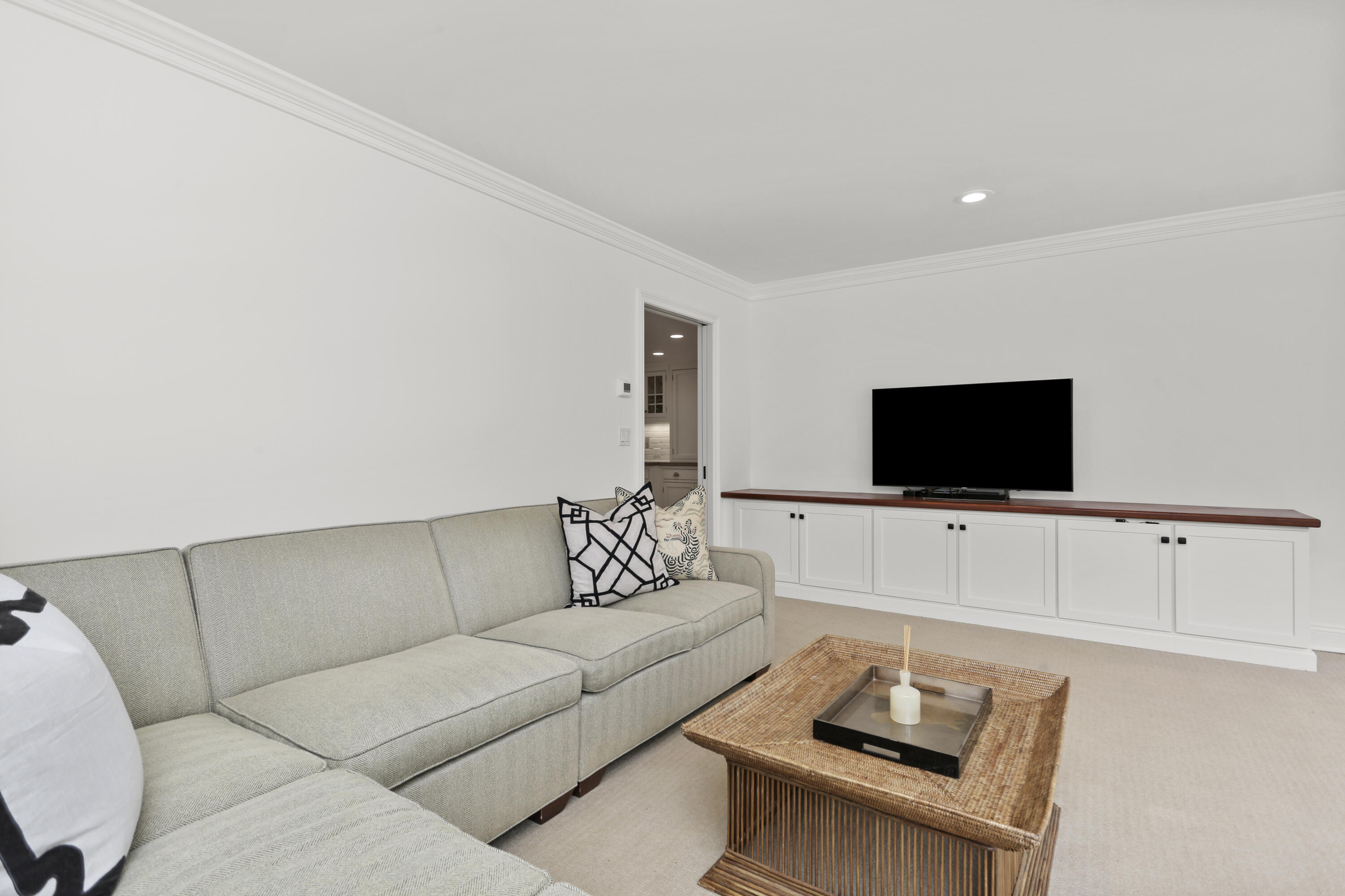 15 Old Farm Road Darien, CT 06820 - Photo 33 of 90 a living room with furniture and a flat screen tv