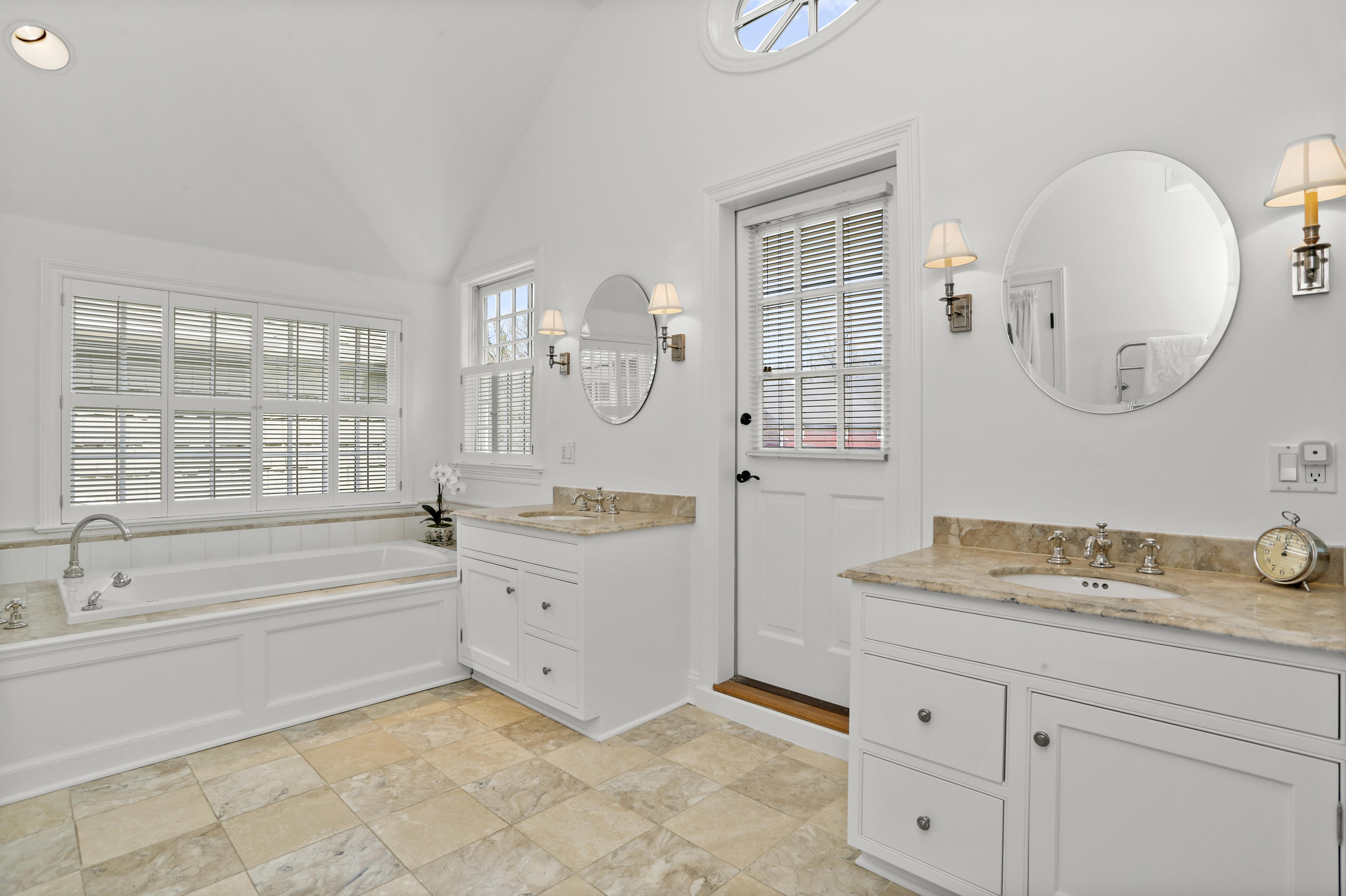 15 Old Farm Road Darien, CT 06820 - Photo 43 of 90 a spacious bathroom with a granite countertop sink mirror and bathtub
