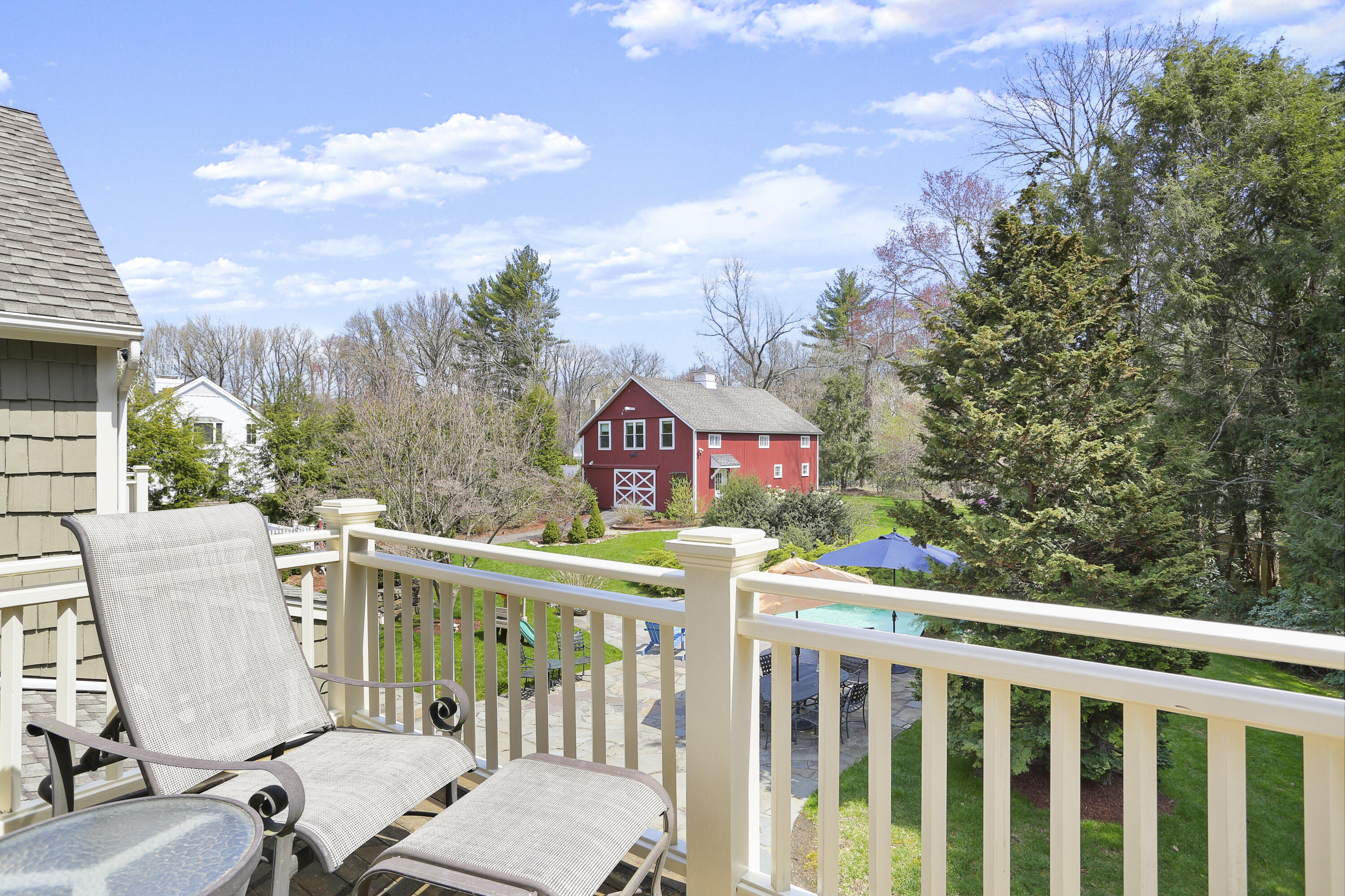 15 Old Farm Road Darien, CT 06820 - Photo 44 of 90 a view of a chairs and table in the roof deck