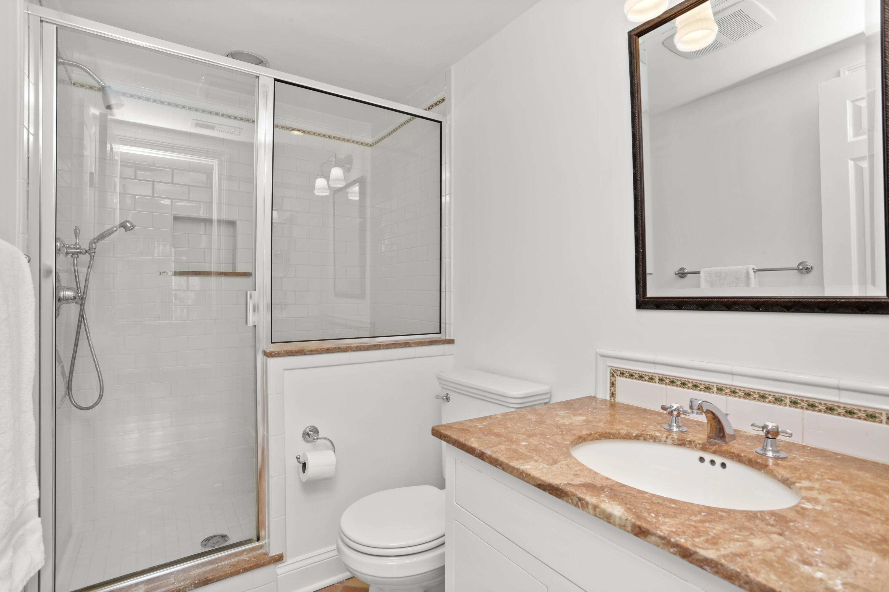 15 Old Farm Road Darien, CT 06820 - Photo 46 of 90 a bathroom with a granite countertop sink toilet and shower