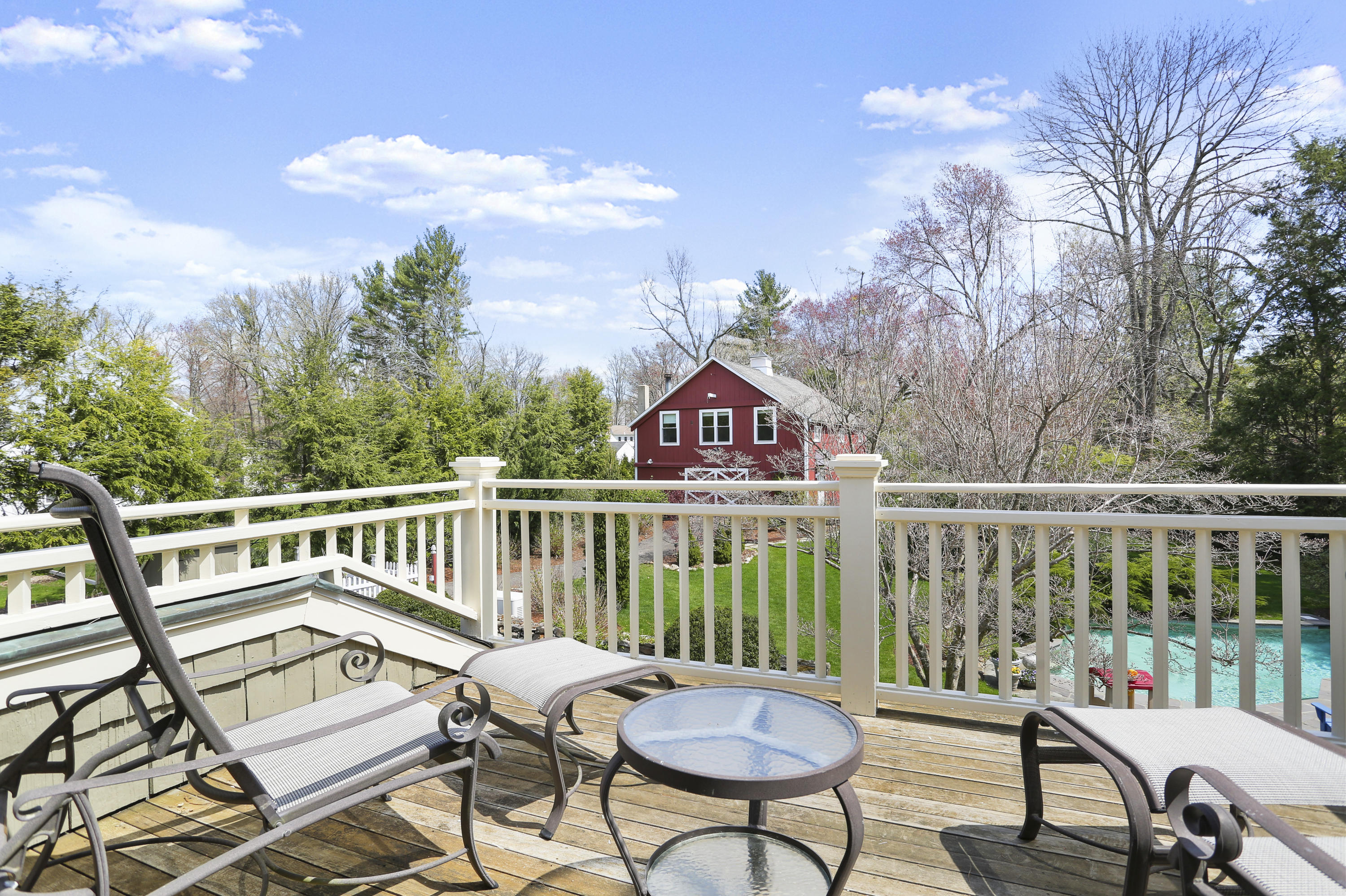 15 Old Farm Road Darien, CT 06820 - Photo 54 of 90 a view of a chairs and table in the balcony