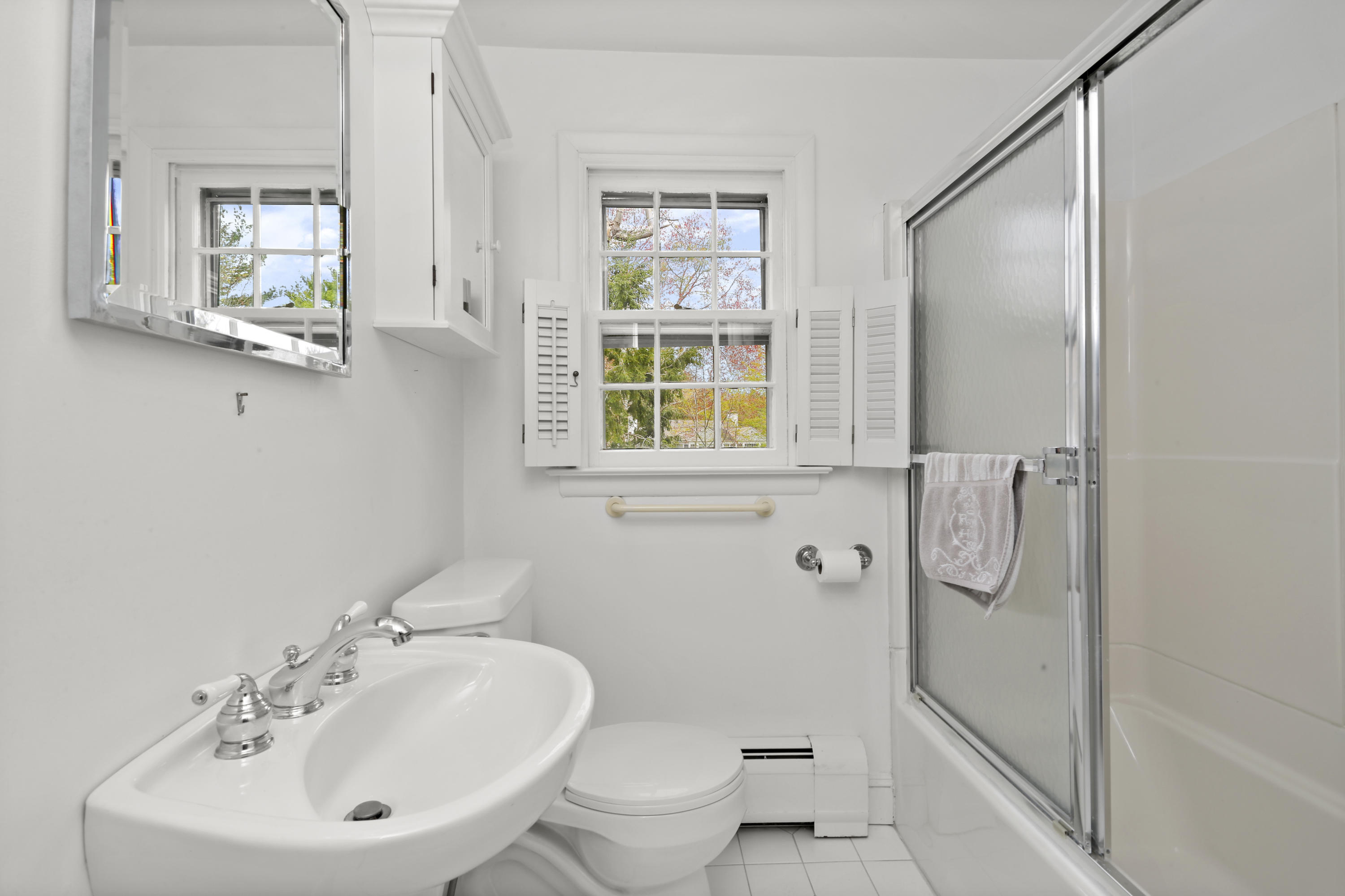 15 Old Farm Road Darien, CT 06820 - Photo 61 of 90 a bathroom with a sink toilet and shower