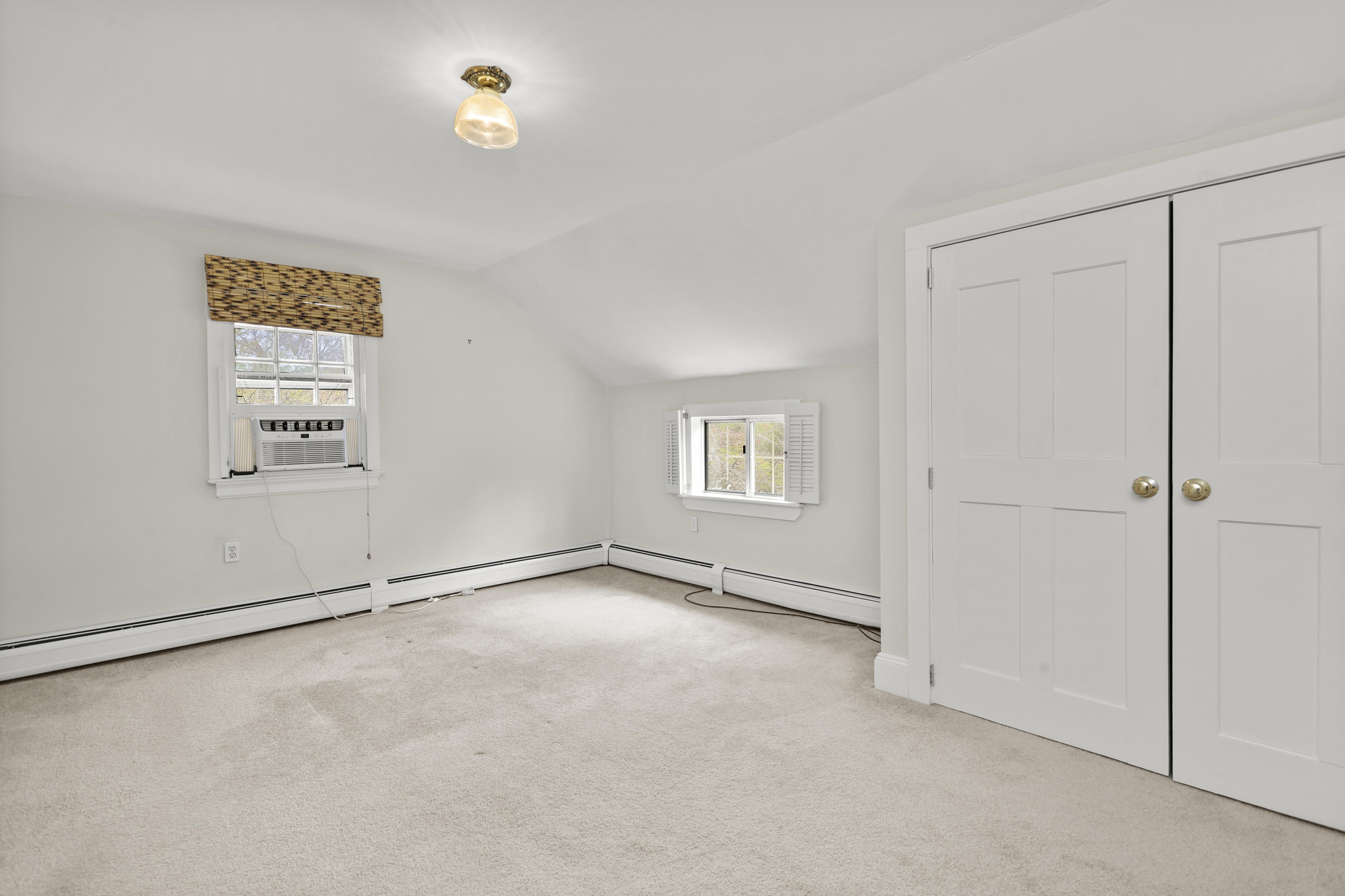 15 Old Farm Road Darien, CT 06820 - Photo 62 of 90 a view of an empty room with a window
