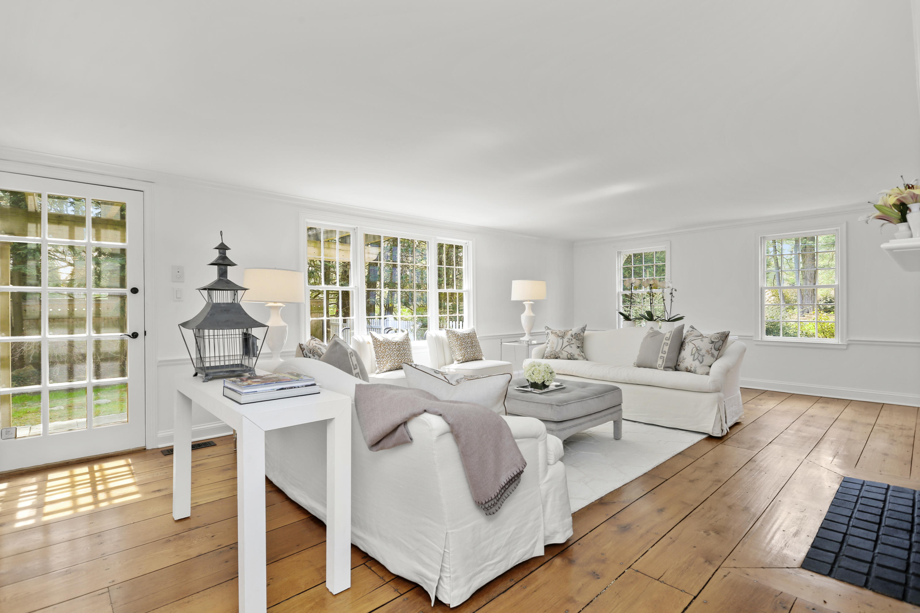 15 Old Farm Road Darien, CT 06820 - Photo 10 of 90 a living room with furniture and floor to ceiling windows