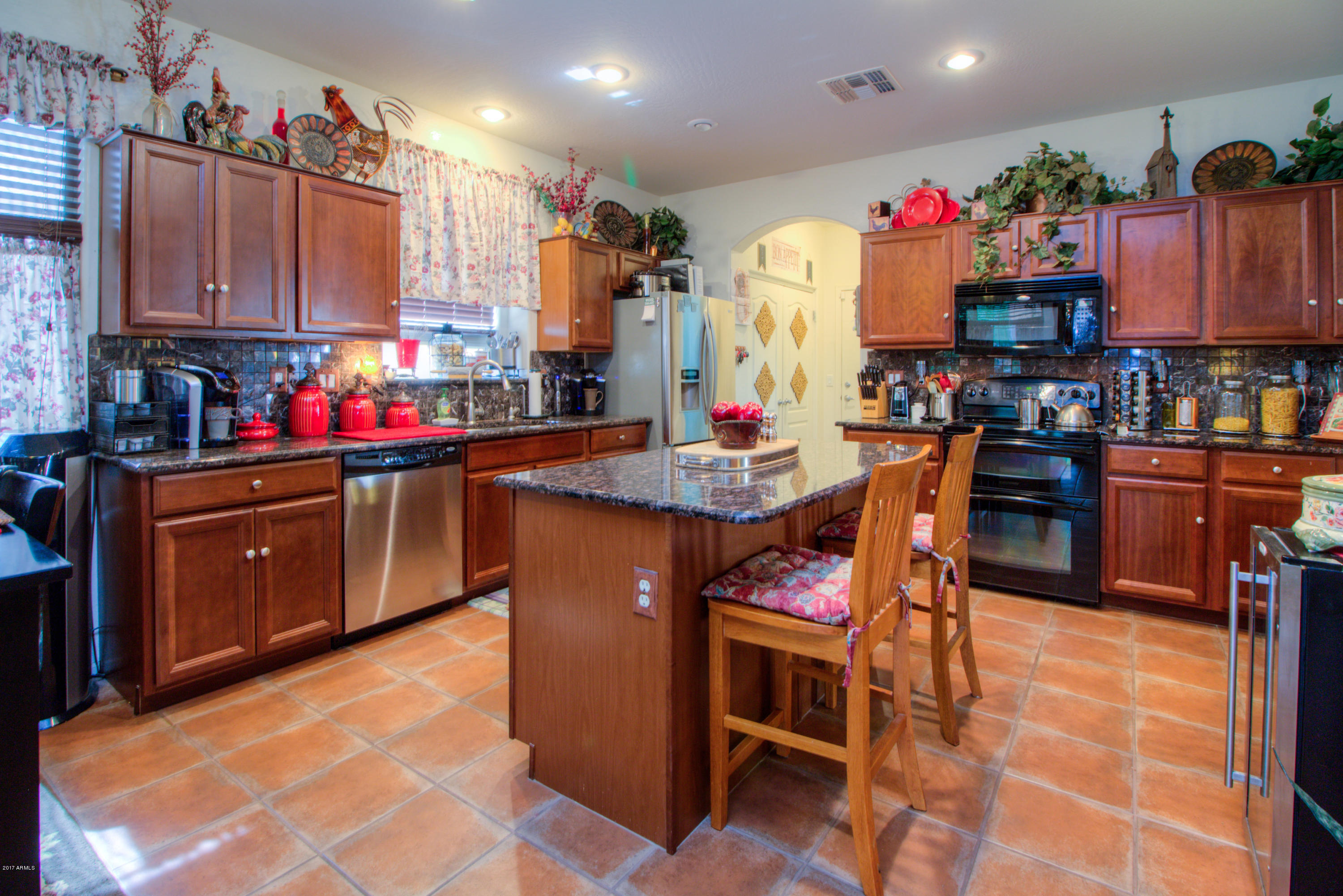 45095 West Jack Rabbit Trail Maricopa, AZ 85139 - Photo 8 of 47 Kitchen with Tile Backsplash