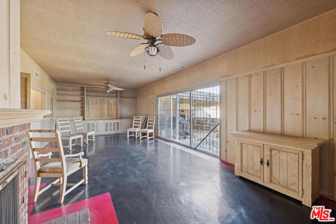5002 Valley Ridge Avenue View Park, CA 90043 - Photo 27 of 44 a view of a livingroom with furniture and hardwood floor