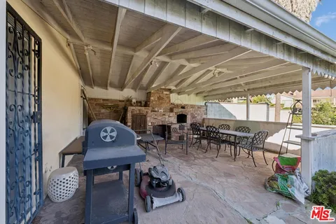 a view of a livingroom with furniture and a rug