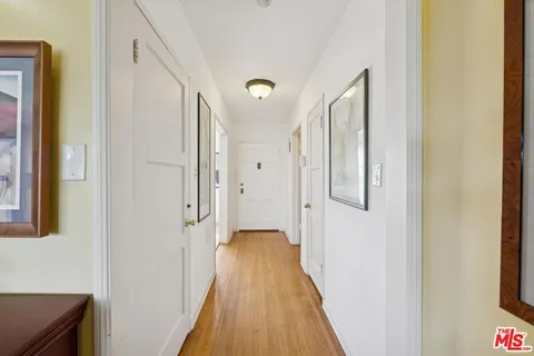 a view of a bathroom from the hallway