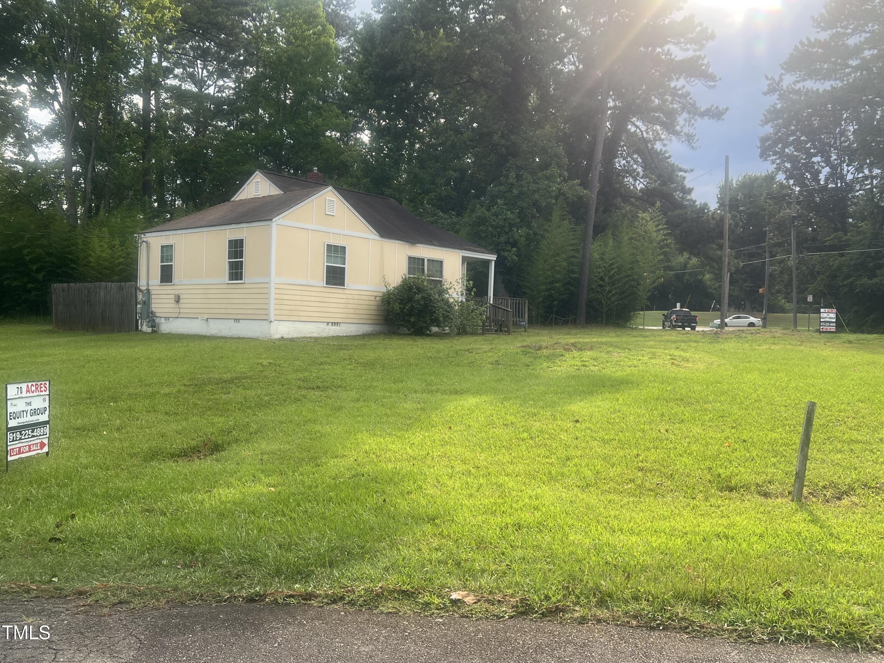 2040 Milburnie Road Raleigh, NC 27610 - Photo 7 of 8 a house view with a outdoor space