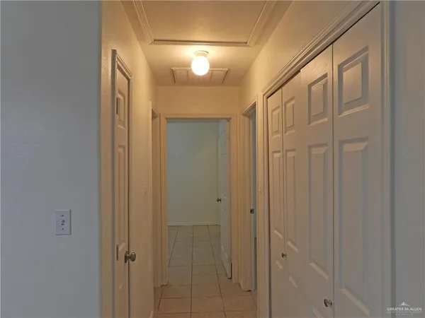a bathroom with a shower and a mirror