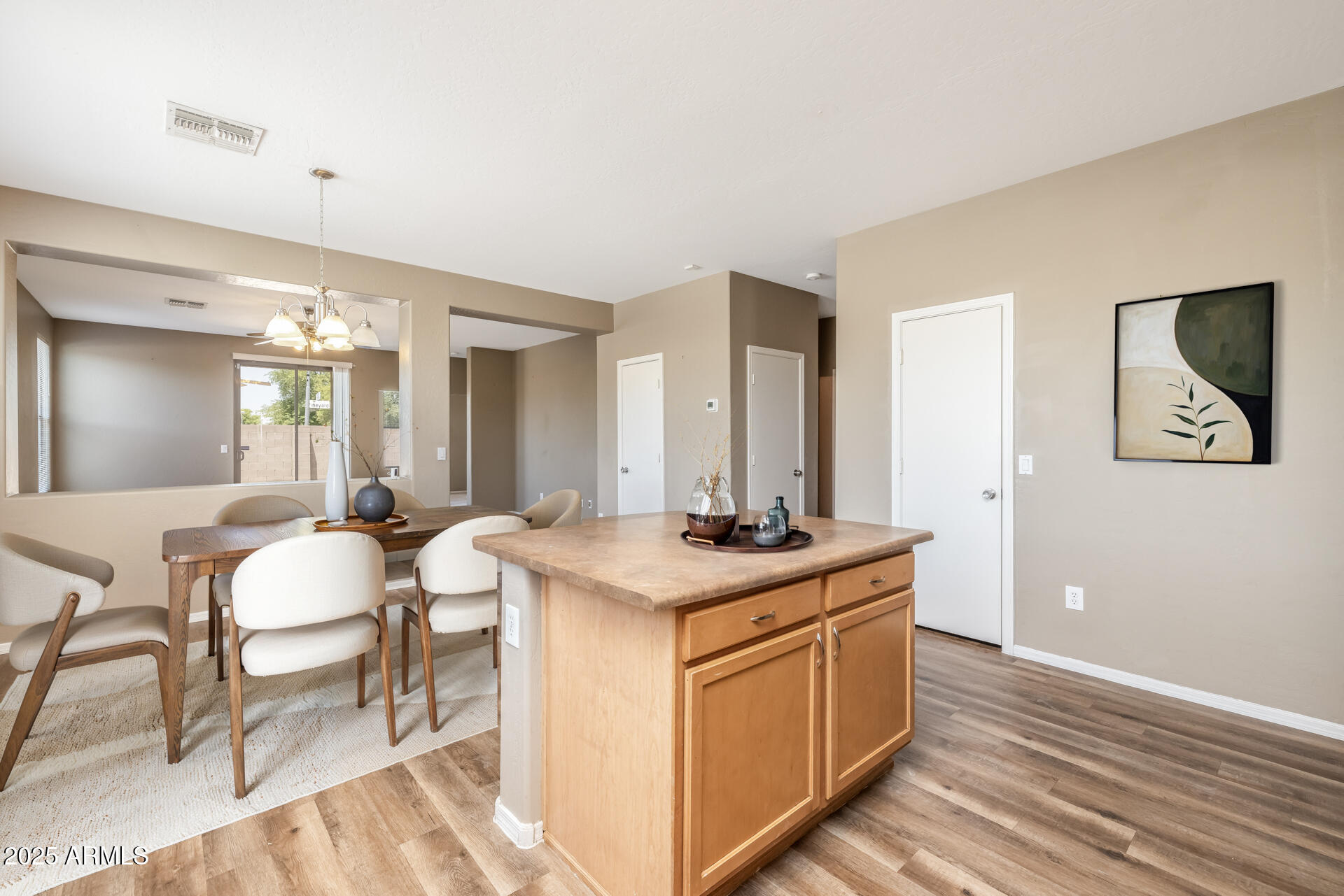 3148 West Maldonado Road Phoenix, AZ 85041 - Photo 10 of 31 a view of a kitchen counter space and windows