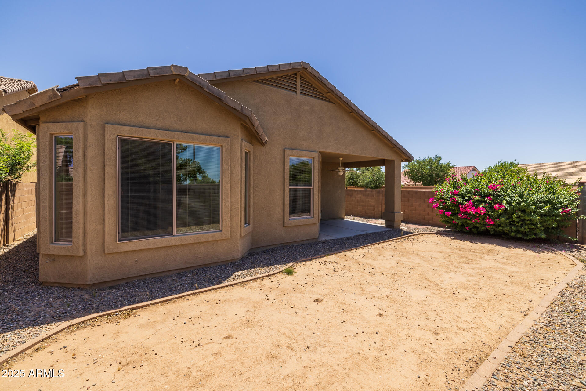 3148 West Maldonado Road Phoenix, AZ 85041 - Photo 26 of 31 a front view of a house with a yard