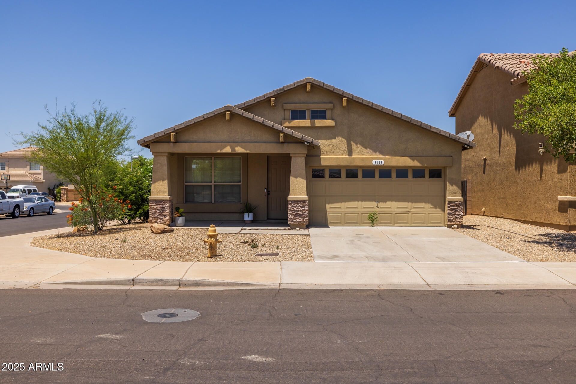 3148 West Maldonado Road Phoenix, AZ 85041 - Photo 30 of 31 a front view of a house with a yard